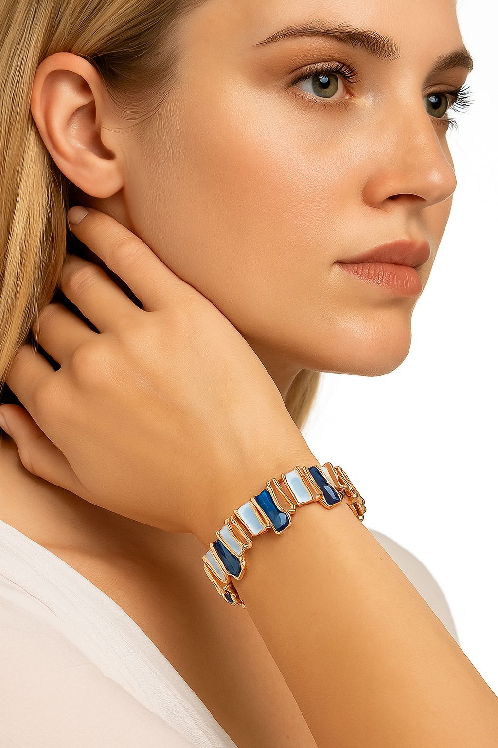 Stretch enamel bangle in blue and ivory worn on wrist