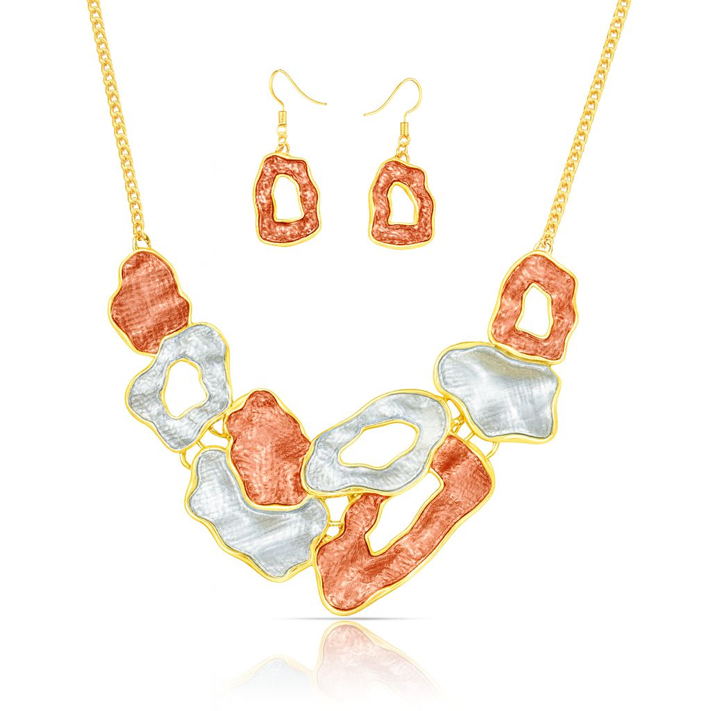 Model wearing abstract hand-painted enamel necklace and earrings in KC gold