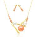 Abstract enamel and pearl necklace with matching drop earrings on white background