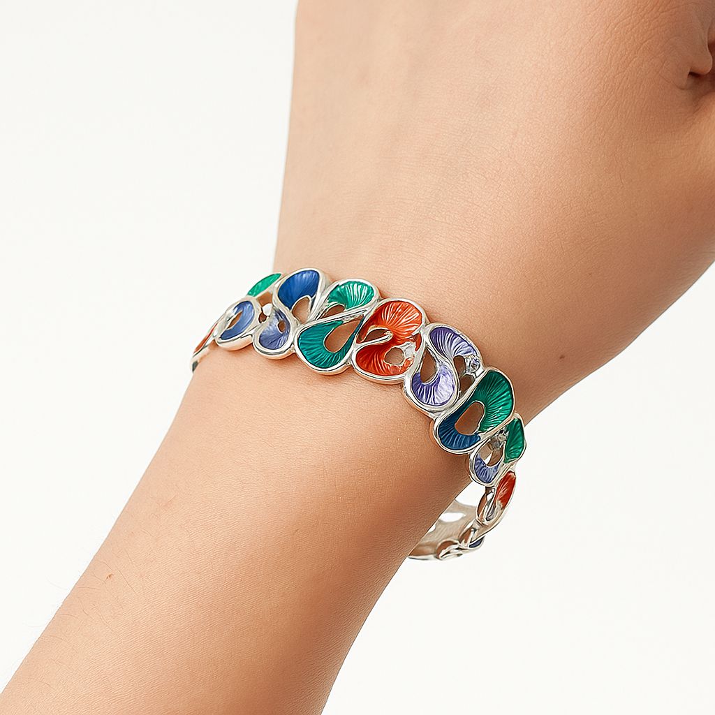 Side view of multicolor spiral enamel statement bracelet