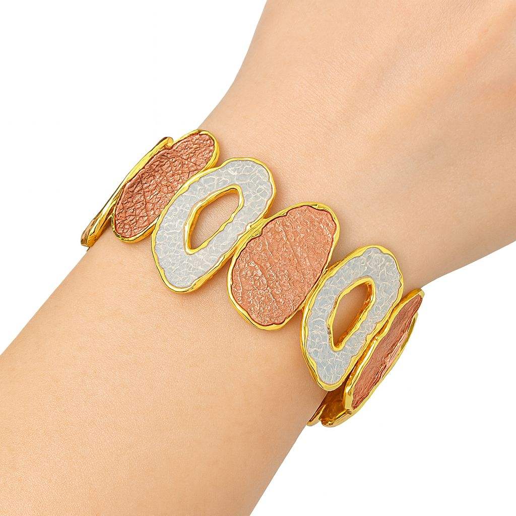 Model wearing the abstract textured gold statement bracelet