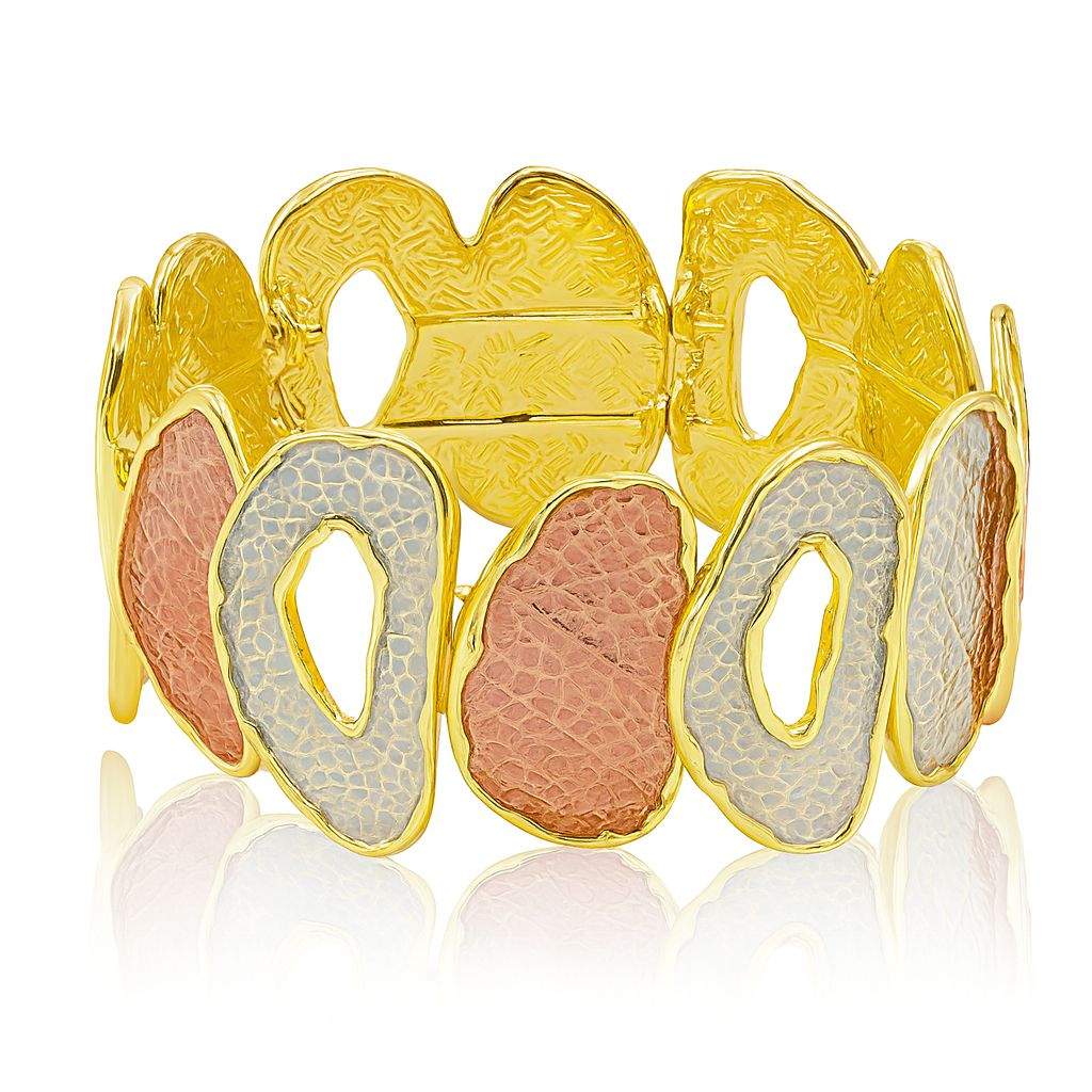 Side angle showing the bracelet’s enamel texture and KC gold finish