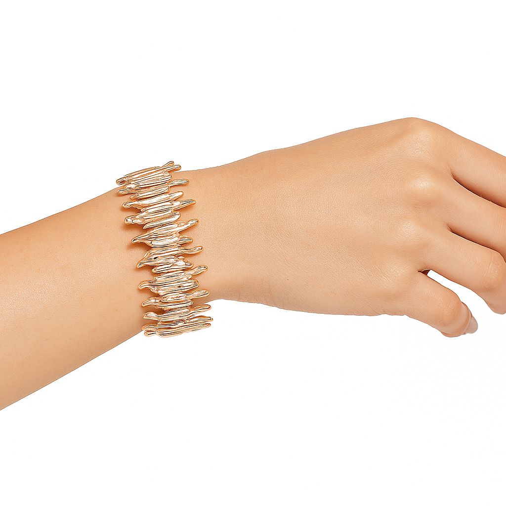 woman wearing abstract wave KC gold bracelet handcrafted alloy bangle