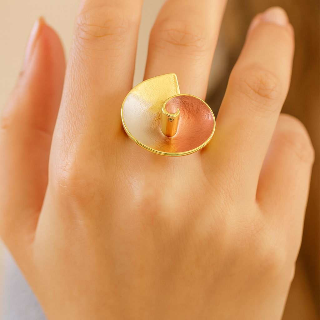 Adjustable sculptural fashion ring with modern swirl design