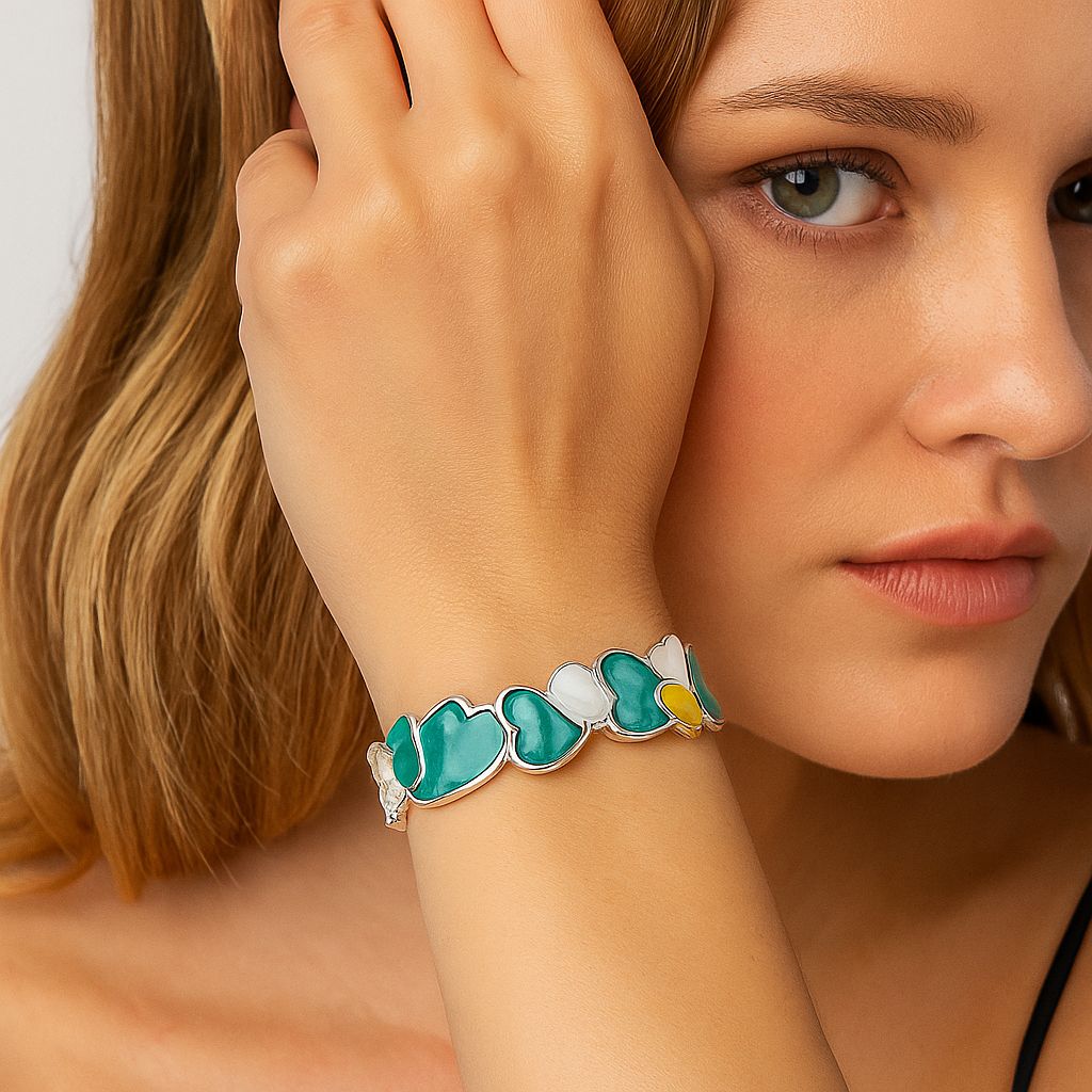 Model wearing handmade enamel bracelet in multicolor design