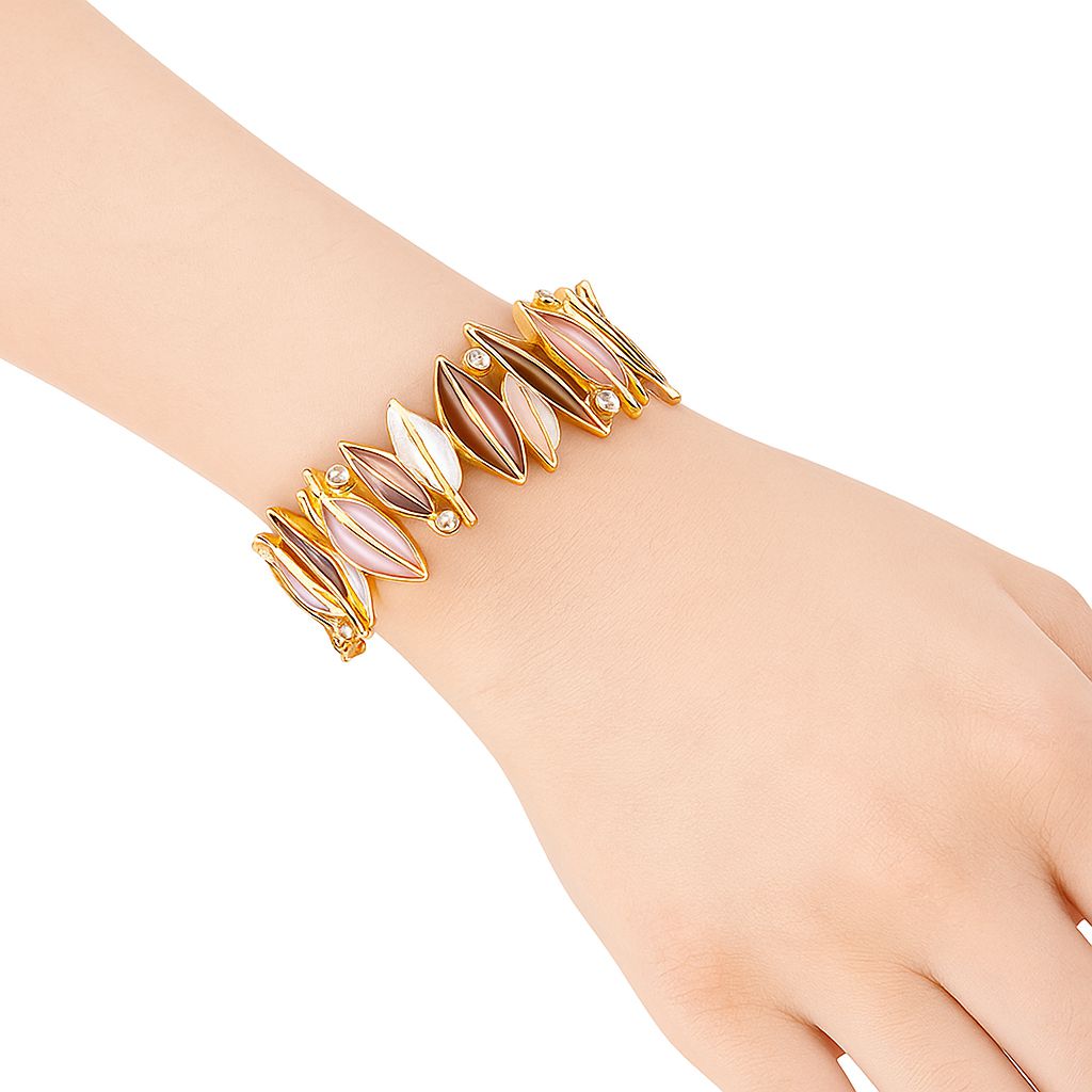 Artistic leaf bracelet with crystal accents in gold plating