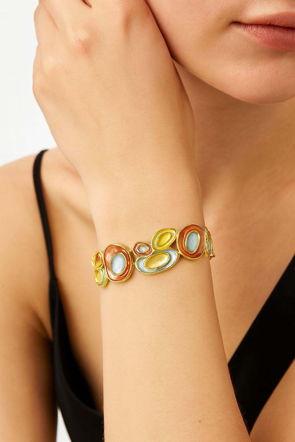 KC gold alloy bracelet with handcrafted oval textures