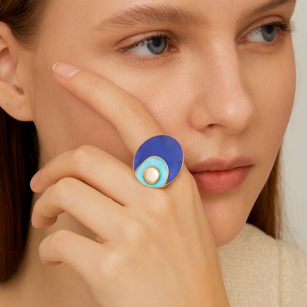 Hand painted enamel statement ring worn on hand in modern artistic style