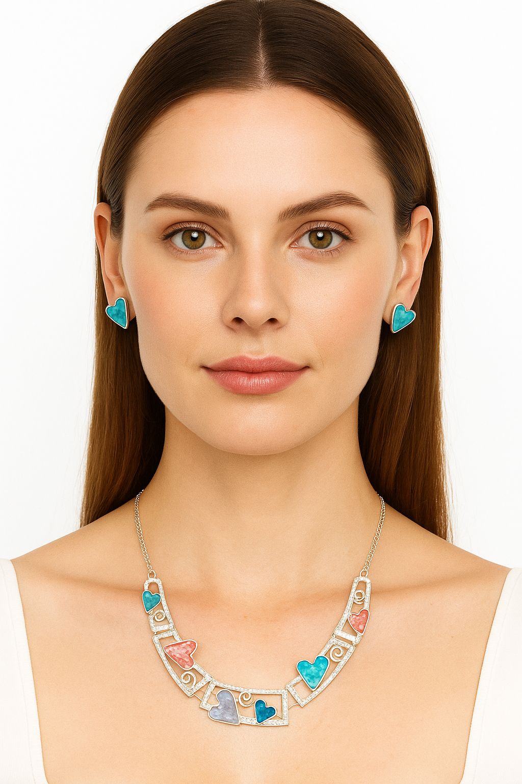 Artistic framed heart necklace and earrings worn by model