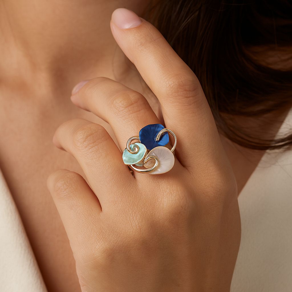 Close up detail of hand painted enamel gold ring