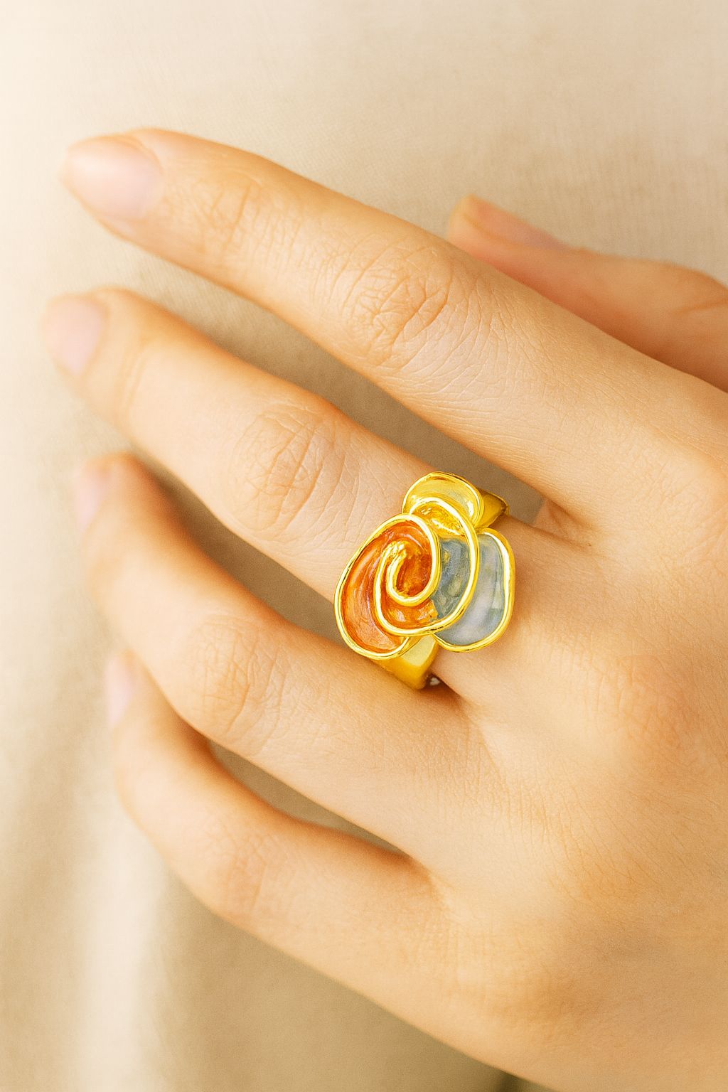 “KC gold adjustable abstract ring with enamel details”
