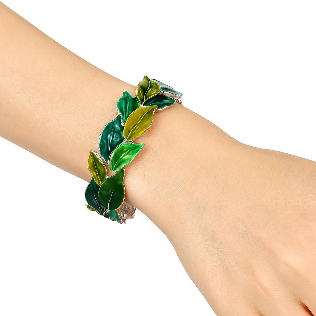 Artistic leaf inspired enamel bracelet on white background