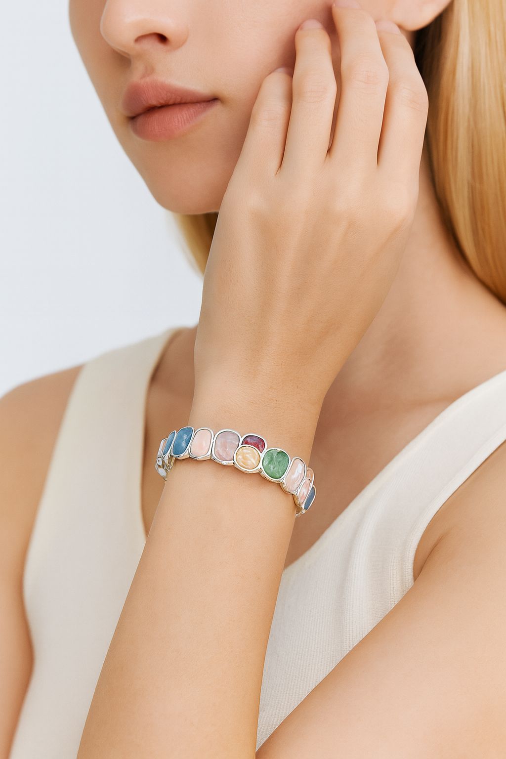 Model wearing artistic pastel enamel bangle