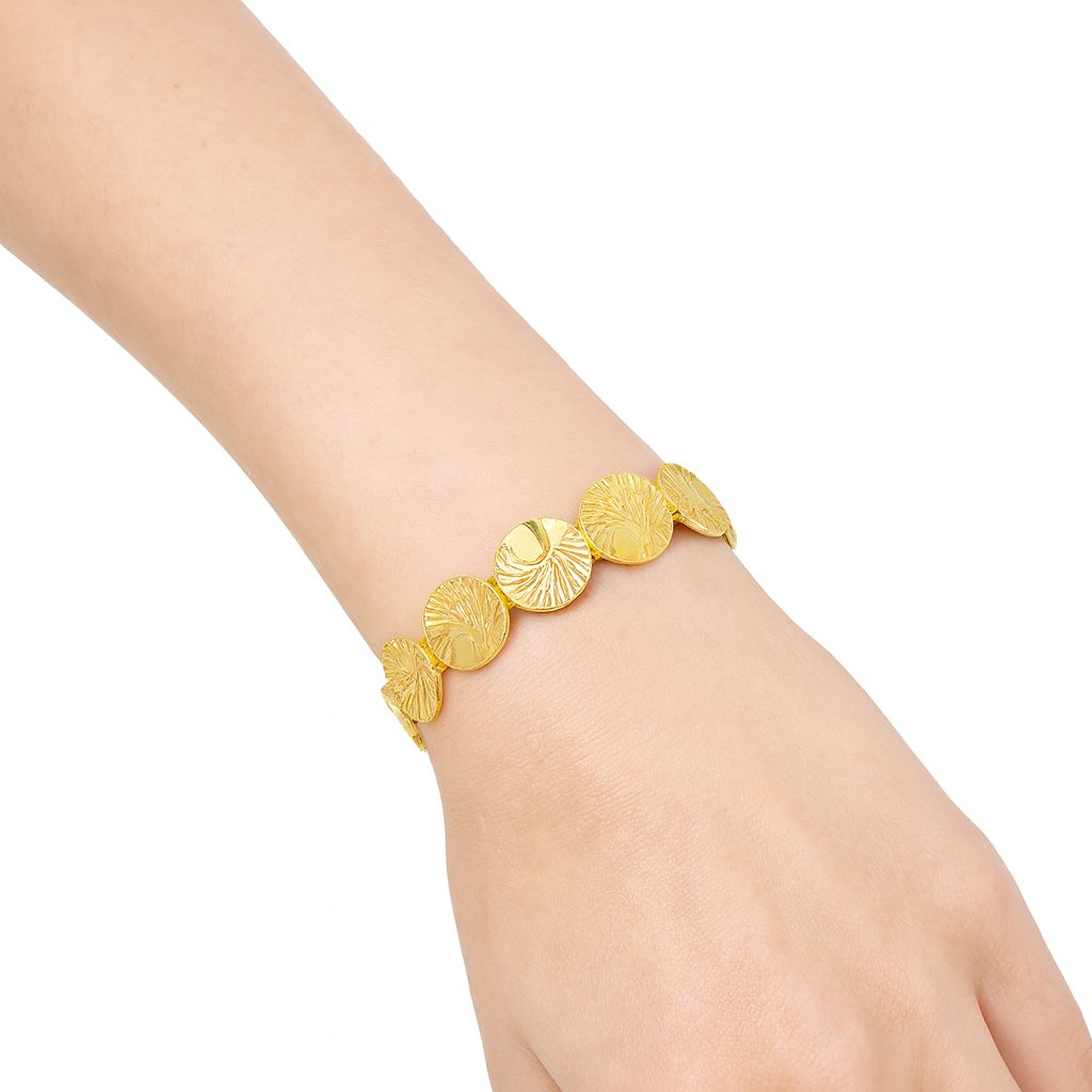 Lightweight fashion gold disc bracelet with artistic details