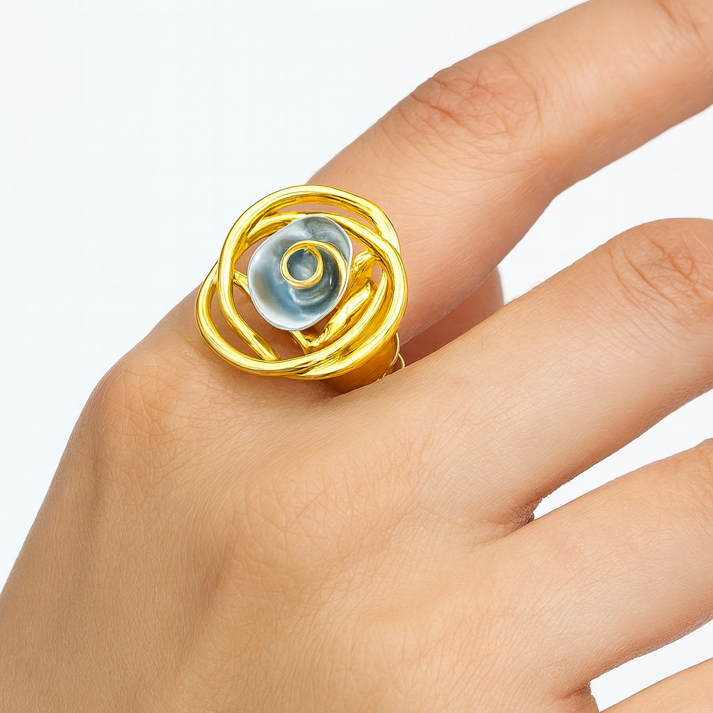Model wearing blue spiral artistic statement ring