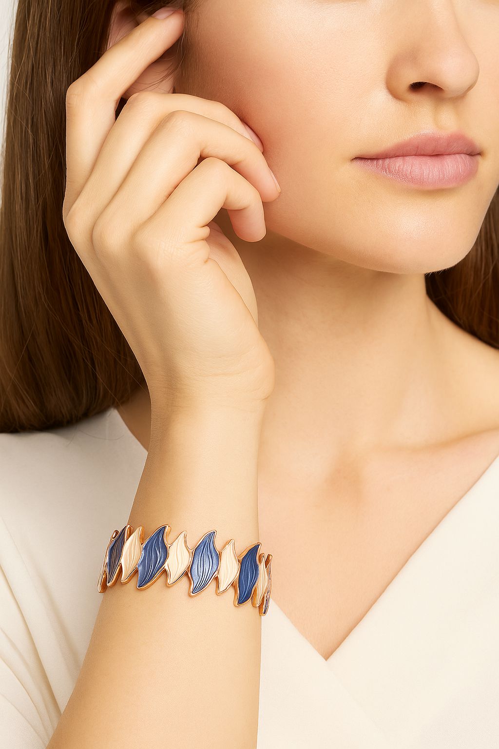 Women wearing blue and ivory enamel leaf bracelet for everyday fashion