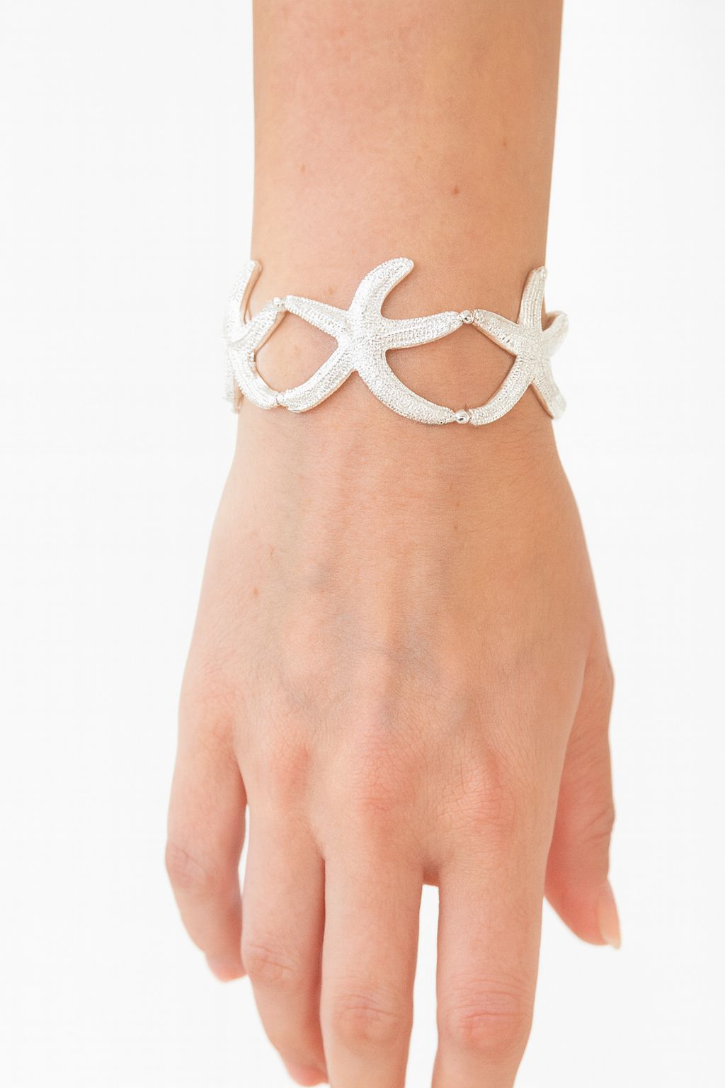 Artistic silver cuff bracelet with starfish pattern for women