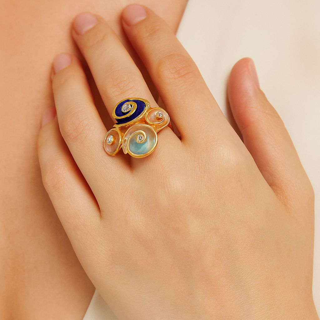 Artistic cluster disc ring worn on finger with gold finish
