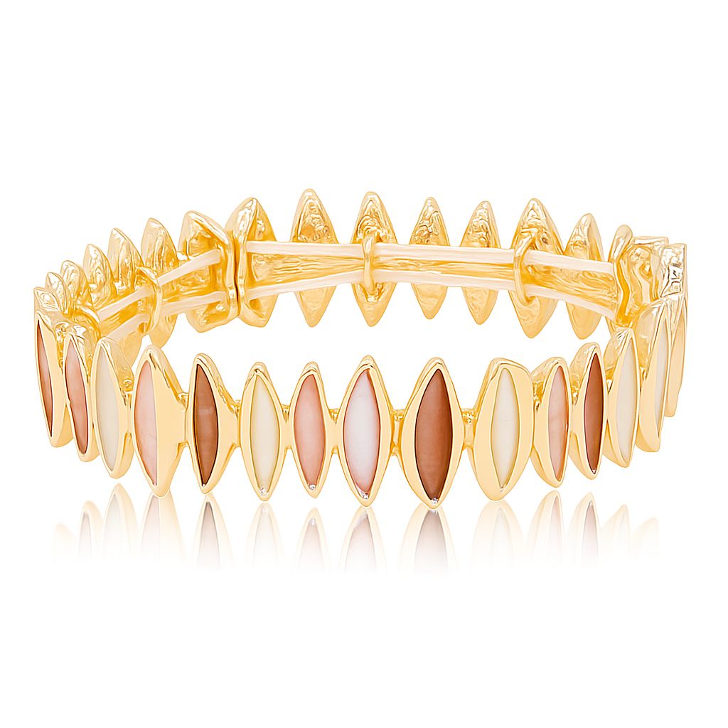 Model wearing gold plated enamel bracelet in soft neutral tones