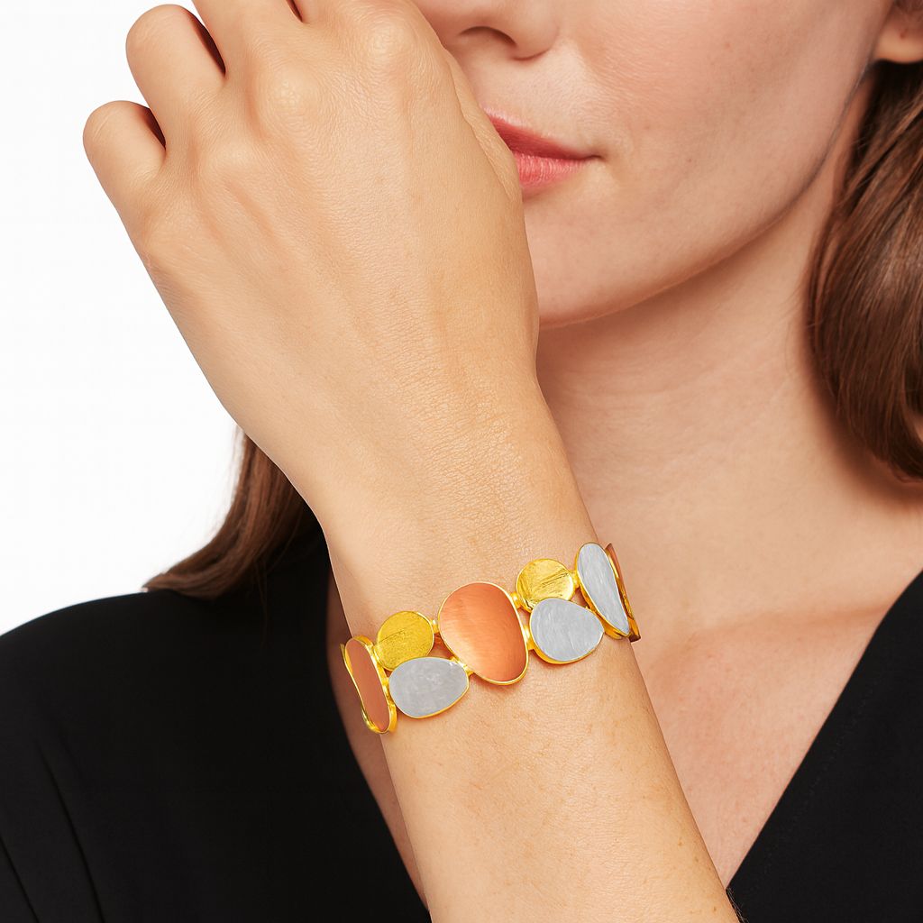 “side view of KC gold plated enamel artistic bracelet”