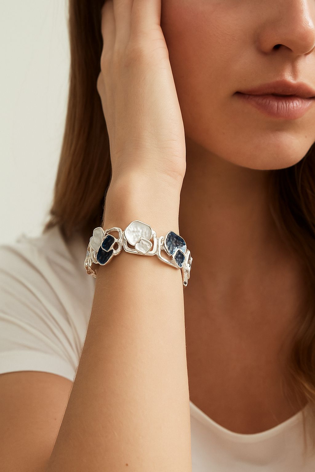 Modern enamel accent bangle worn on model