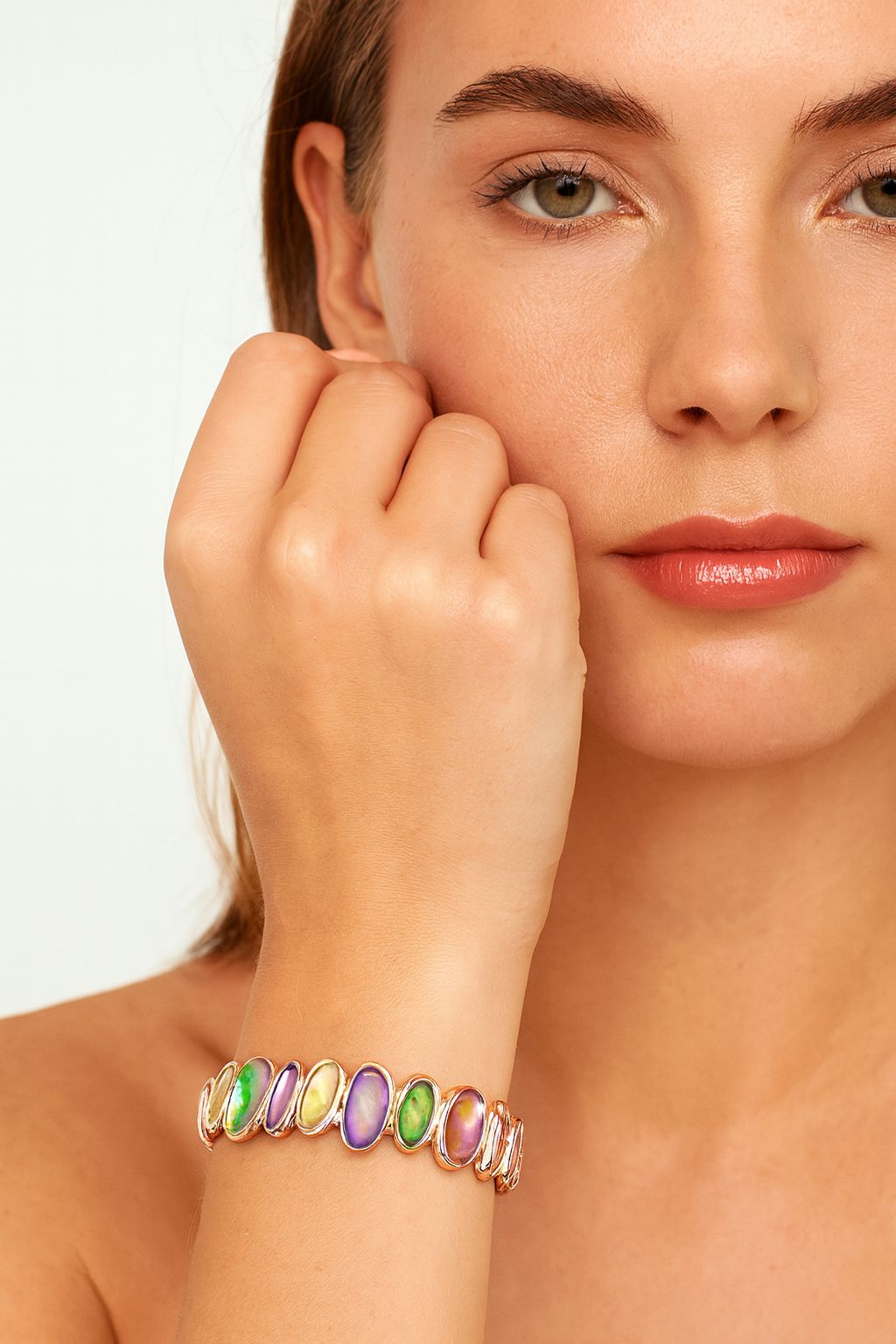 KC gold-plated stretch bracelet shown on wrist