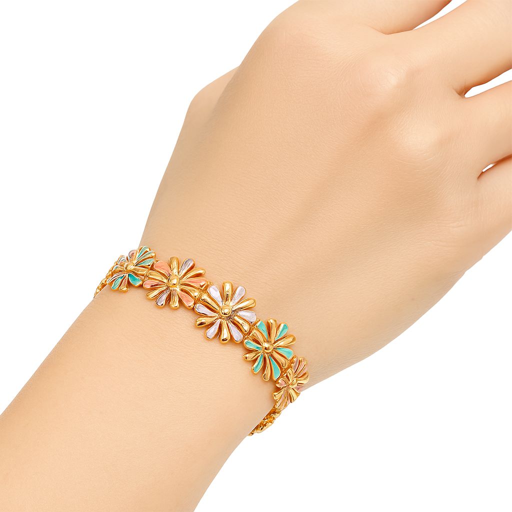 Model wearing floral enamel bangle on wrist