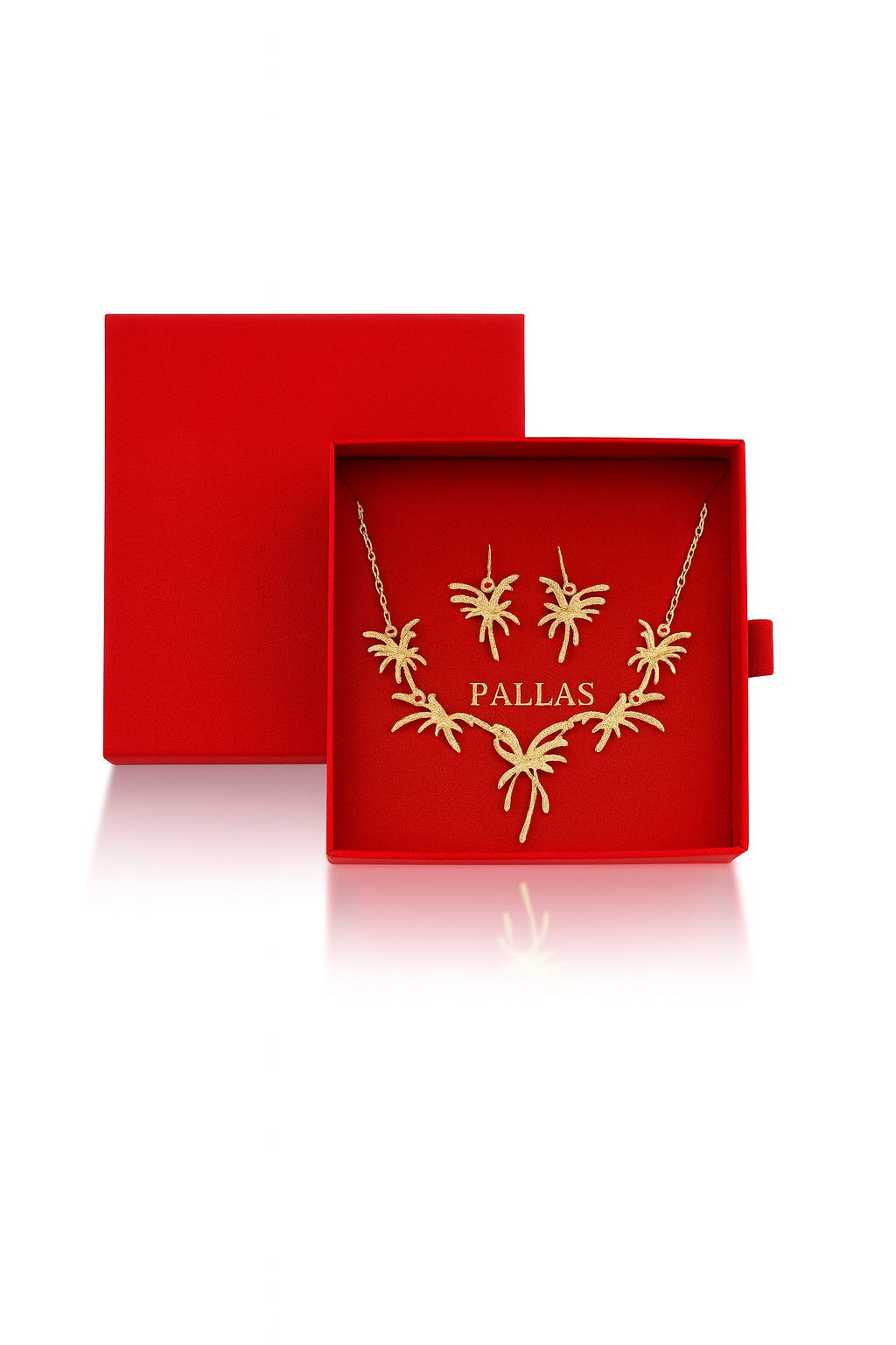 Modern sculptural gold necklace with coordinating earrings