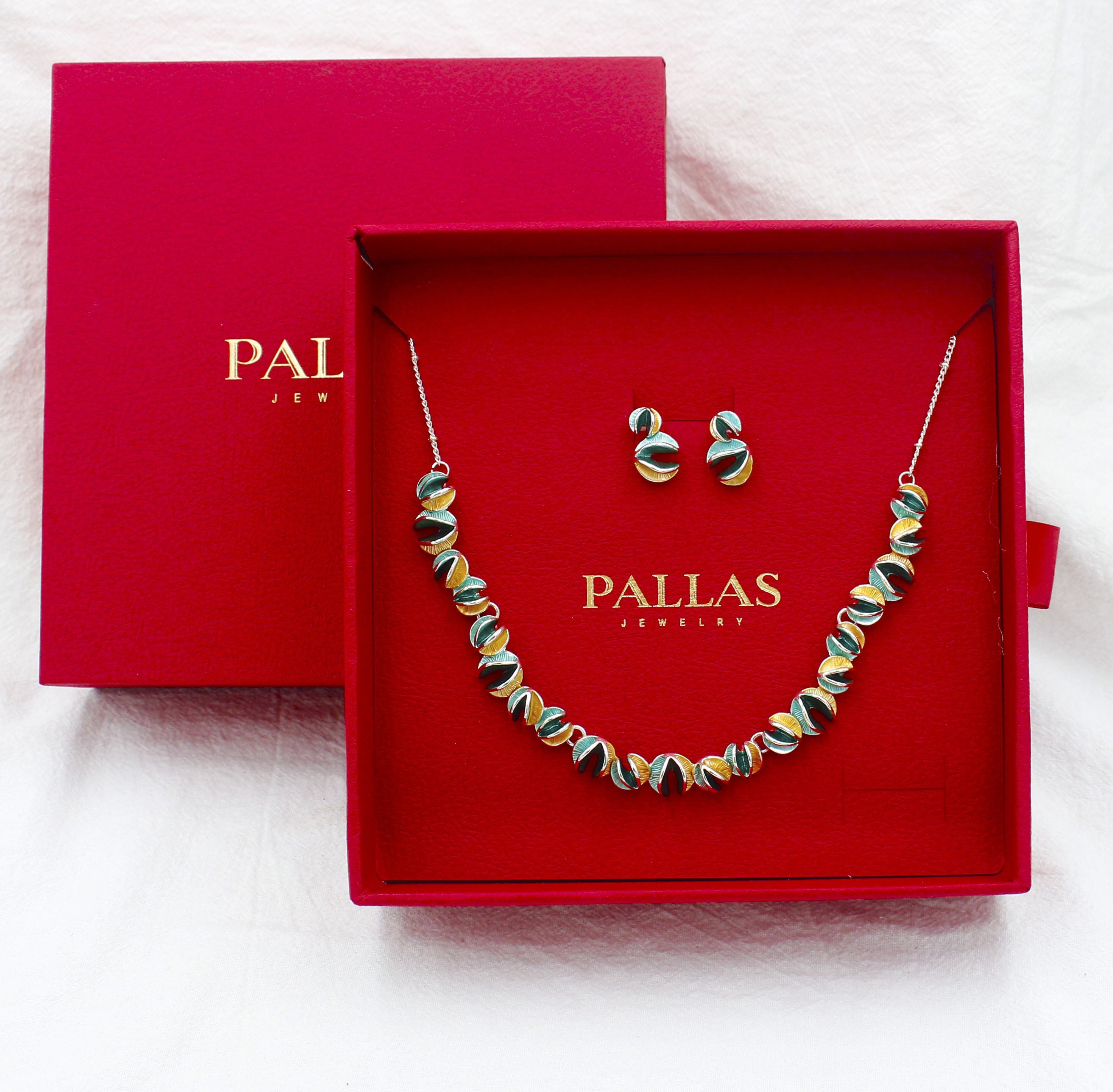 Sculpted disc necklace and earrings set in luxury gift box