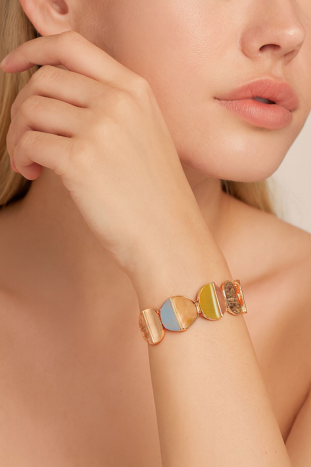 Women’s multicolor enamel bangle bracelet shown on wrist
