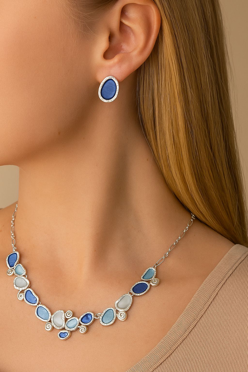 Enamel necklace and earring set with KC gold plating on white background