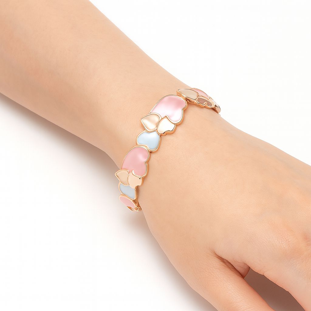 Lightweight pastel heart bracelet with hand-painted enamel finish