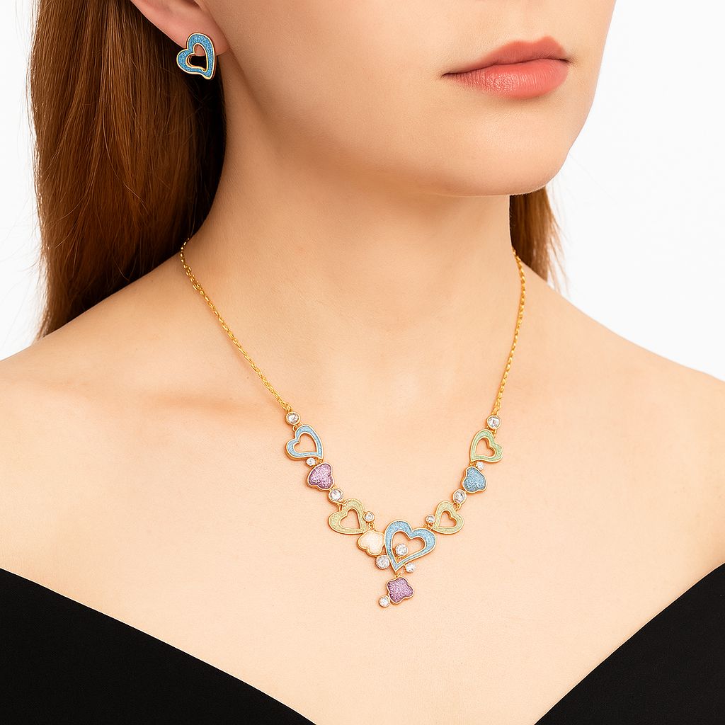 Hand painted enamel heart earrings close up view