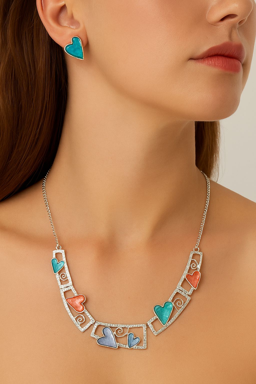 Hand painted enamel heart stud earrings close up view