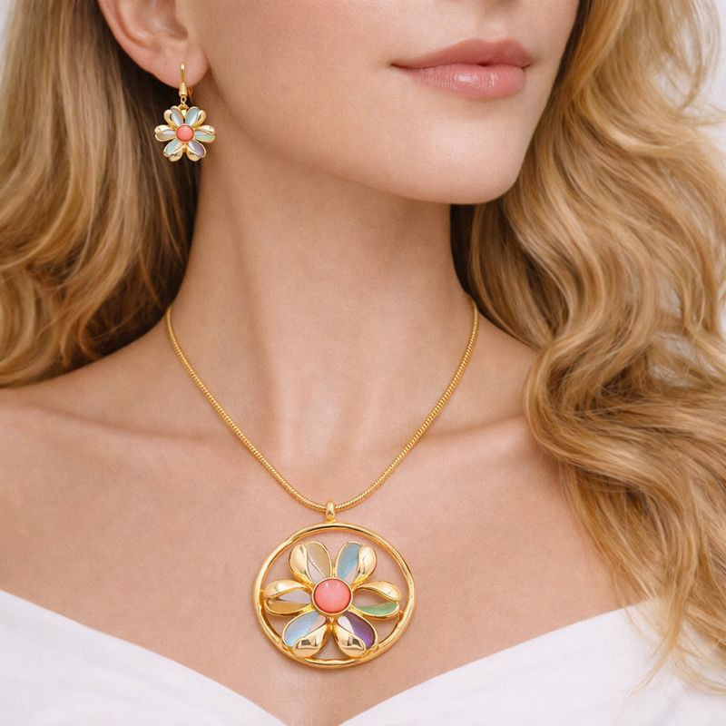 Model wearing hand painted enamel necklace and matching earrings