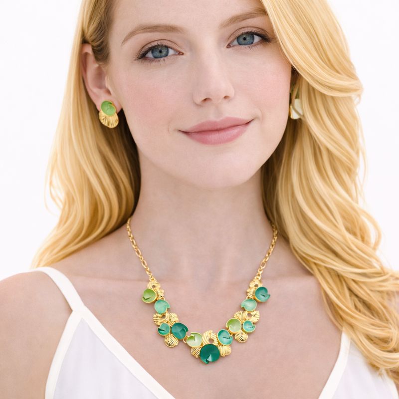 Artistic enamel necklace and earrings worn by model in KC gold plating