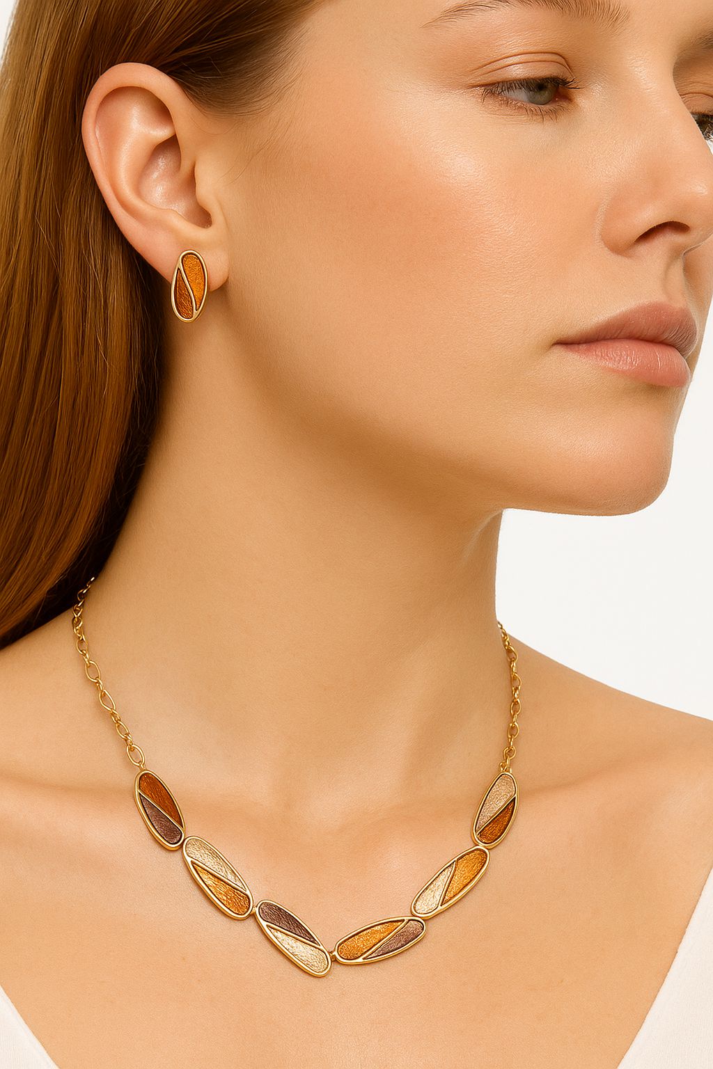 Side view of hand-painted enamel earrings and necklace set