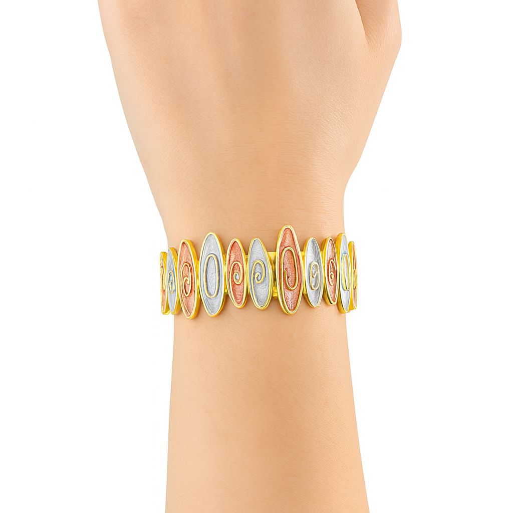 Elegant artistic enamel bracelet in gold plating on wrist