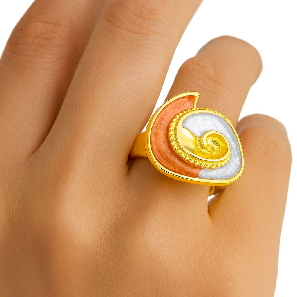 Modern abstract spiral ring plated in KC gold”