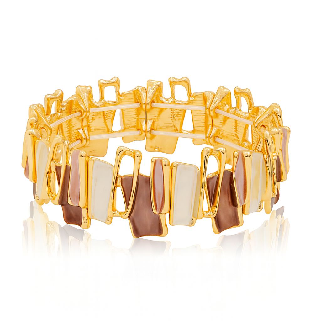 Model wearing modern enamel bracelet in gold and neutral tones