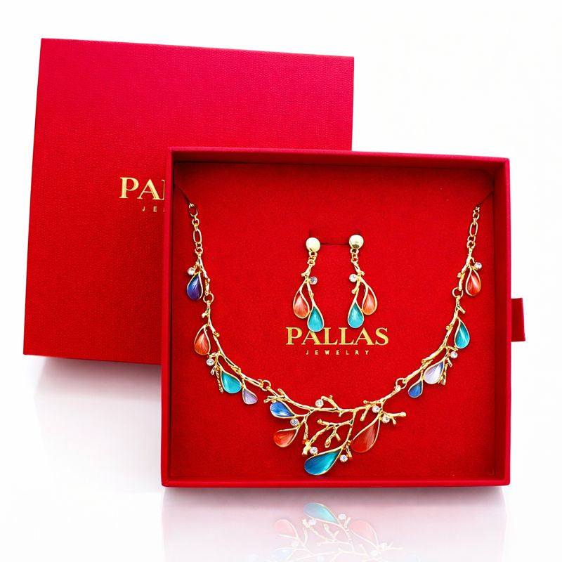 Artisan branch style necklace with colorful enamel leaves