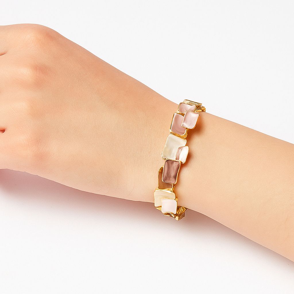 Fashion bracelet styled on model in KC gold and enamel design