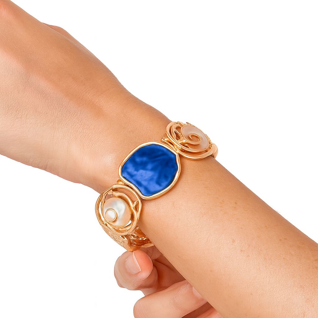 Fashion model wearing hand-painted KC gold bracelet for women