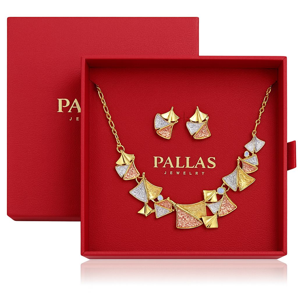 Model wearing KC gold painted necklace and earrings set