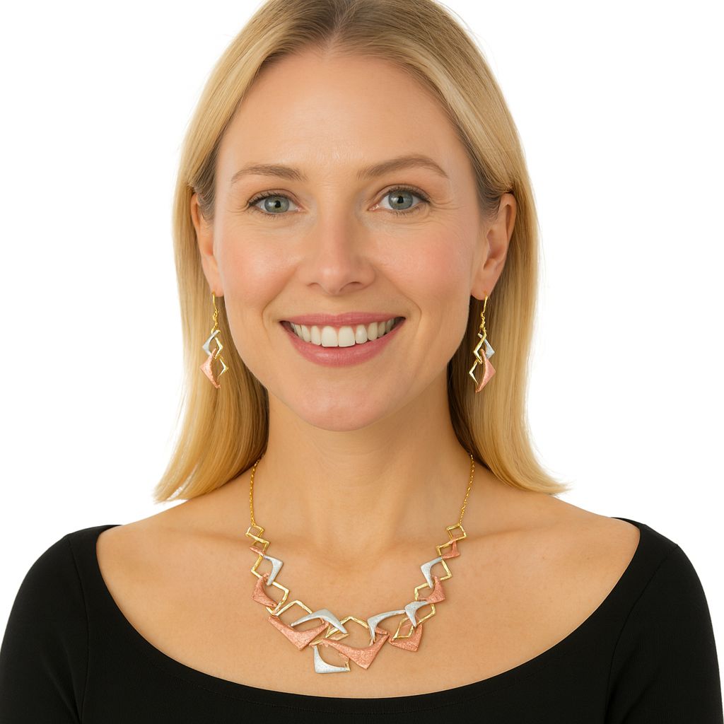 Close-up of enamel hand-painted geometric drop earrings