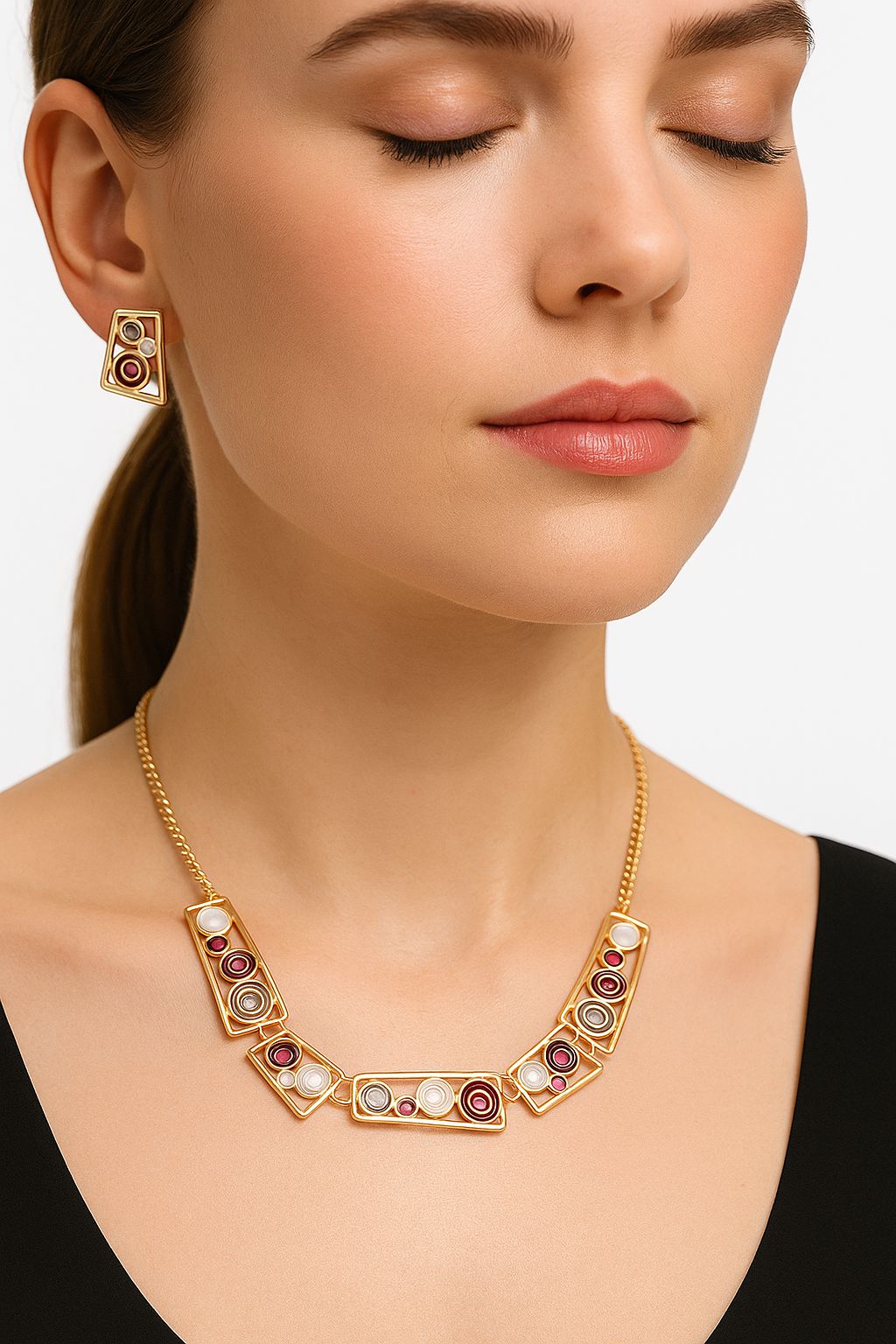 Close-up of hand-painted enamel geometric necklace with KC gold plating