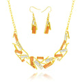 “Geometric KC gold plated necklace and earrings set with hand-painted enamel”
