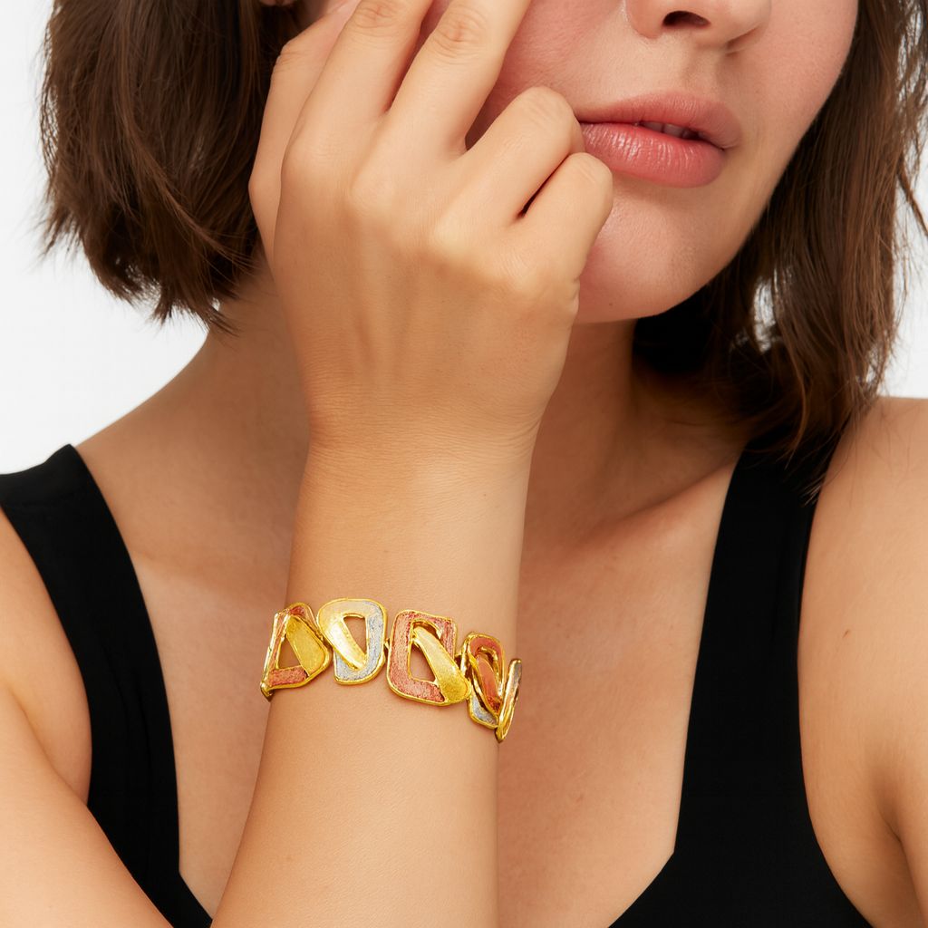 Modern geometric bangle in apricot, grey and gold enamel