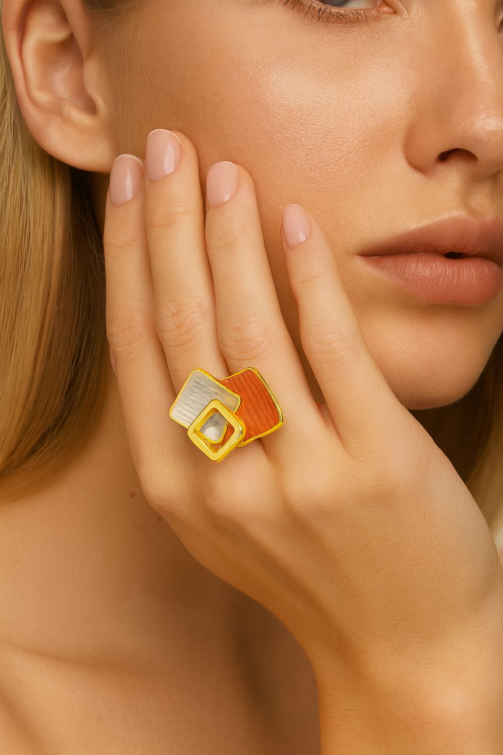 Model wearing geometric square enamel statement ring in hand-painted enamel