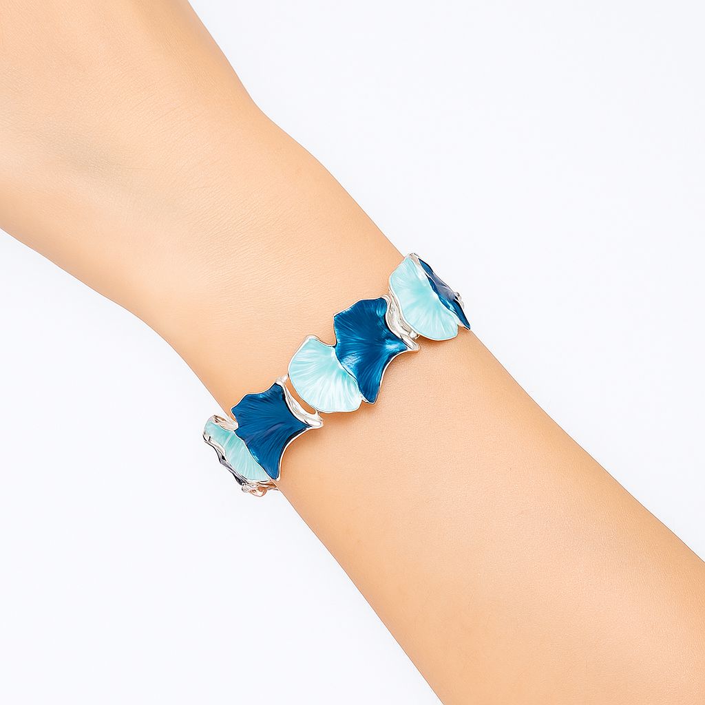 close up model wearing artistic blue ginkgo leaf hand painted bracelet